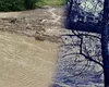 Cod roșu de inundații. A fost emis RO-Alert, drumuri blocate după ploile torențiale. Apele au năvălit în casele oamenilor