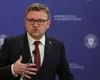 Marius Budăi pune presiune pe Guvern: Premierul Bolojan este obligat să majoreze salariul minim prin lege