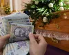 Ajutor de înmormântare 2026, suma a crescut odată cu salariul minim. Cine încasează peste 9000 de lei, ce acte sunt obligatorii și în cât timp intră banii