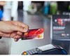 Noua taxă care se aplică pentru plata cu cardul. Tariful ascuns care vă poate lăsa fără bani