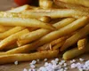 Cum prepari cei mai delicioși cartofi prăjiți. Ingredientul din bucătărie care face diferența