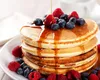Ingredientul secret din clătitele americane ca să iasă pufoase și delicioase. Poți renunța la praf de copt și bicarbonat