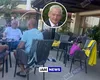 Sorin Oprescu, fotografiat relaxat la masă cu prietenii, pe terasa unui hotel din Grecia deși în România este condamnat la 10 ani și 8 luni de închisoare