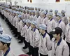 Soluţia chinezească la criză. Angajaţii de la stat au voia să-şi mai ia un job în privat