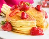 Clătite cu ricotta și sirop de citrice, un adevărat deliciu. Rețeta ideală pentru diminețile de vară