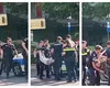 Scene halucinante în centrul Capitalei. Un bărbat a fost legat și luat pe sus de polițiști după ce și-a agresat soția