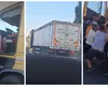 Încă un șofer de TIR blochează traficul. Bărbatul a fost scos cu forța din cabină și imobilizat după ce a oprit de-a curmezișul șoselei