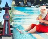 Ho-Ho-HOT! Moș Crăciun, în pantaloni scurți și fără sanie. Laponia se topește sub un val de căldură record de peste 30°C