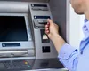 Ce trebuie să faci dacă găseşti bani uitaţi într-un bancomat. Ce sumă maximă poţi opri
