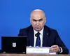 Coaliţia a stabilit măsurile din următorul pachet al guvernului Bolojan. Tăieri de posturi în administraţie, oraşe care devin comune şi desfiinţări de instituţii
