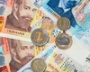 Cu trei zile înainte de trecerea la euro, bulgarii scot teancuri de leva „de la saltea”. Băncile se confruntă cu un aflux fără precedent