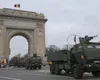 Paradă la Bucureşti, de Ziua Naţională. Aproape 3.000 de militari vor defila pe sub Arcul de Triumf. Premierul Bolojan merge la parada militară de la Alba Iulia, unde și-a anunțat prezența lui Călin Georgescu