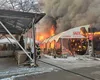Incendiu la un restaurant din Craiova. Focul a cuprins și mai multe spații comerciale aflate în apropiere