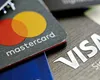 Anunţul momentului pentru românii care au carduri Visa şi Mastercard. Vine de la UE!