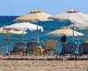 Scumpiri masive în Thassos. Cât a ajuns consumația minimă pentru un șezlong în 2026