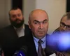 Prim-ministrul Ilie Bolojan desființează proiectul AUR referitor la amendarea oficialilor care nu sărută drapelul: „Credința și patriotismul se gestionează discret. Patriot nu este cel care face paradă”