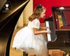 La doar 8 ani, mica pianistă Iliana Stanciu uimește publicul din Viena și Bangkok