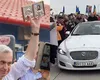 Călin Georgescu, escortat la Oradea cu un Jaguar deținut de o inspectoare ANAF. Soțul acestia a candidat din partea partidului fondat de Traian Băsescu iar acum este adept AUR