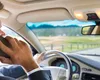 Amenzile pentru vorbit la telefon la volan pot fi anulate dacă polițistul nu descrie tipul de telefon în procesul-verbal