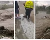 VIDEO Urgie în Prahova, o viitură a inundat case şi a distrus maşini. Imagini apocalitice la Vâlcăneşti