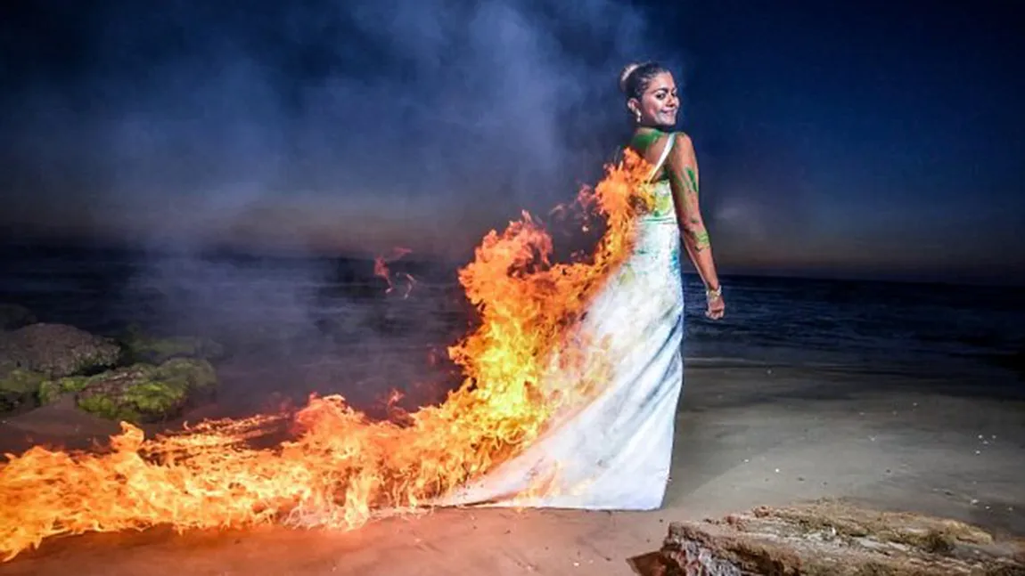 O mireasă noncomformistă şi-a dat foc la rochie, de dragul artei. Vezi cum a stins flăcările VIDEO