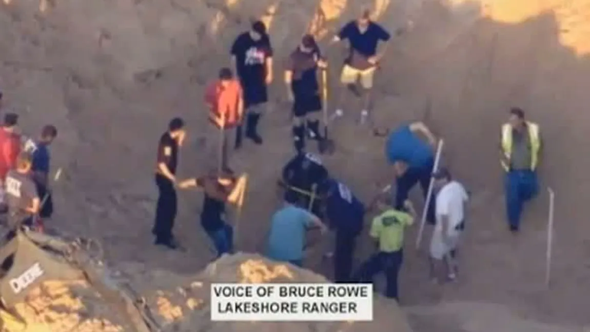 Un băiat de 8 ani a supravieţuit TREI ORE îngropat sub nisip, lângă Lacul Michigan VIDEO
