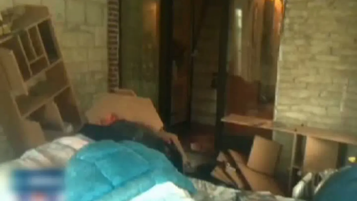 Trei case devastate de poliţia belgiană în căutarea unei românce