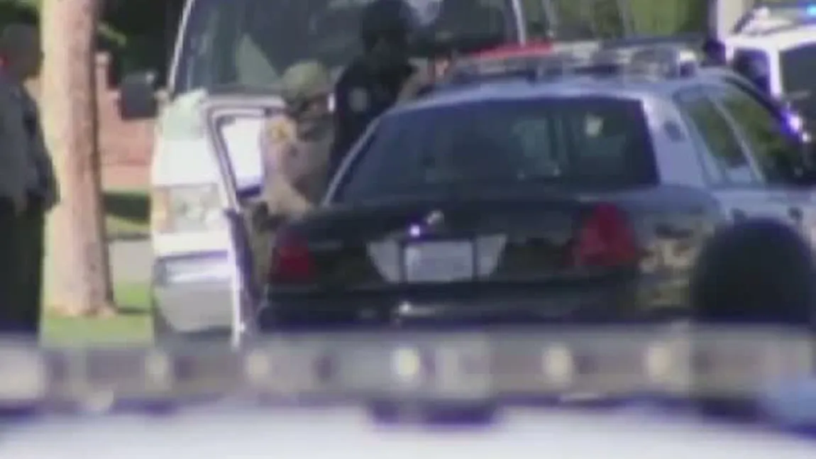 O femeie şi fiica sa au fost ţinute ostatice ore întregi de un bărbat înarmat VIDEO