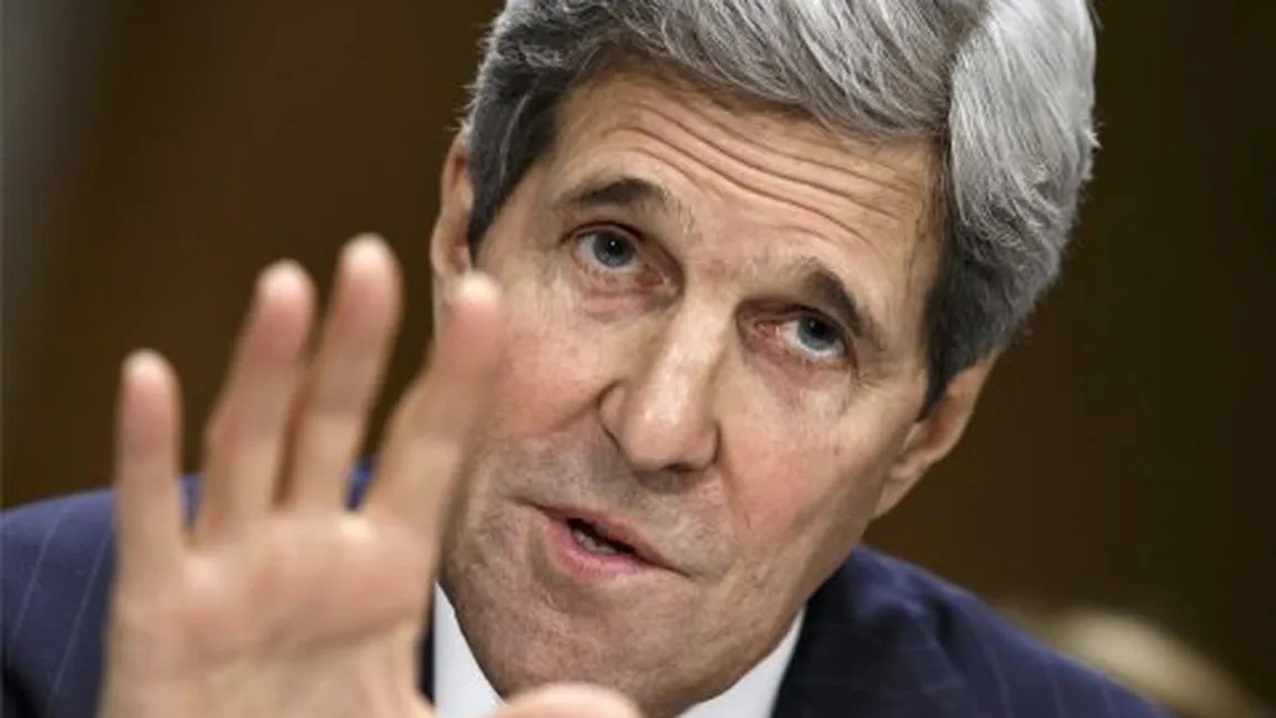 GROTESC: Stomacul lui John Kerry s-a întors pe dos. A văzut un copil ţinând CAPUL TĂIAT al unui soldat