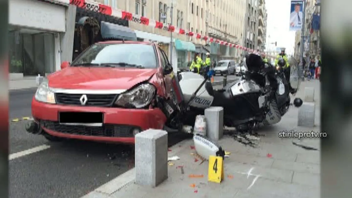 Accident în Capitală: Poliţist pe motocicletă, rănit şi dus la spital cu ambulanţa FOTO