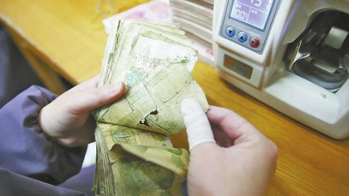 Un oraş din China îşi procură o parte din energie din arderea bancnotelor scoase din uz