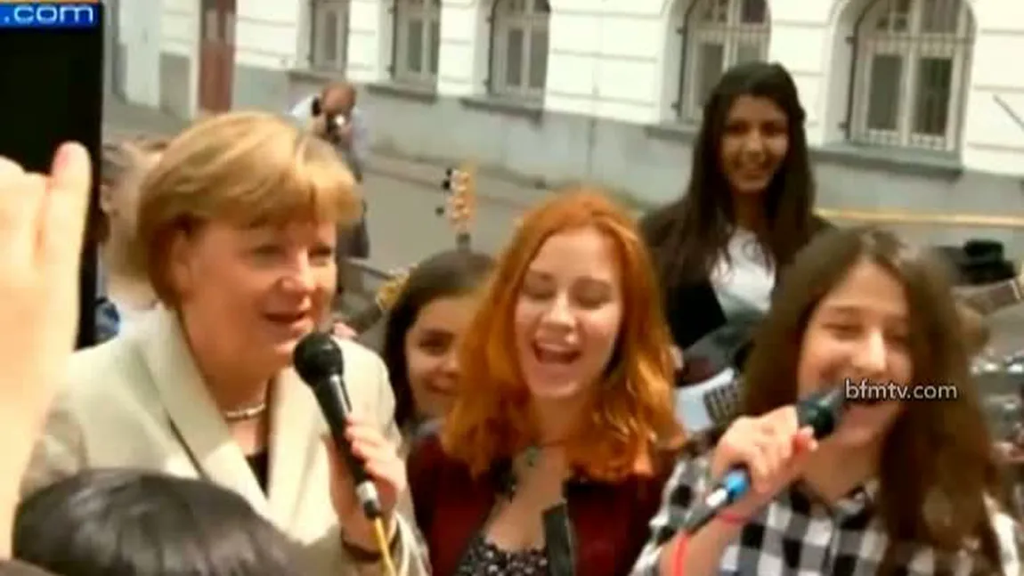 Angela Merkel are cariera asigurată în muzică. A cântat împreună cu mai mulţi liceeni VIDEO