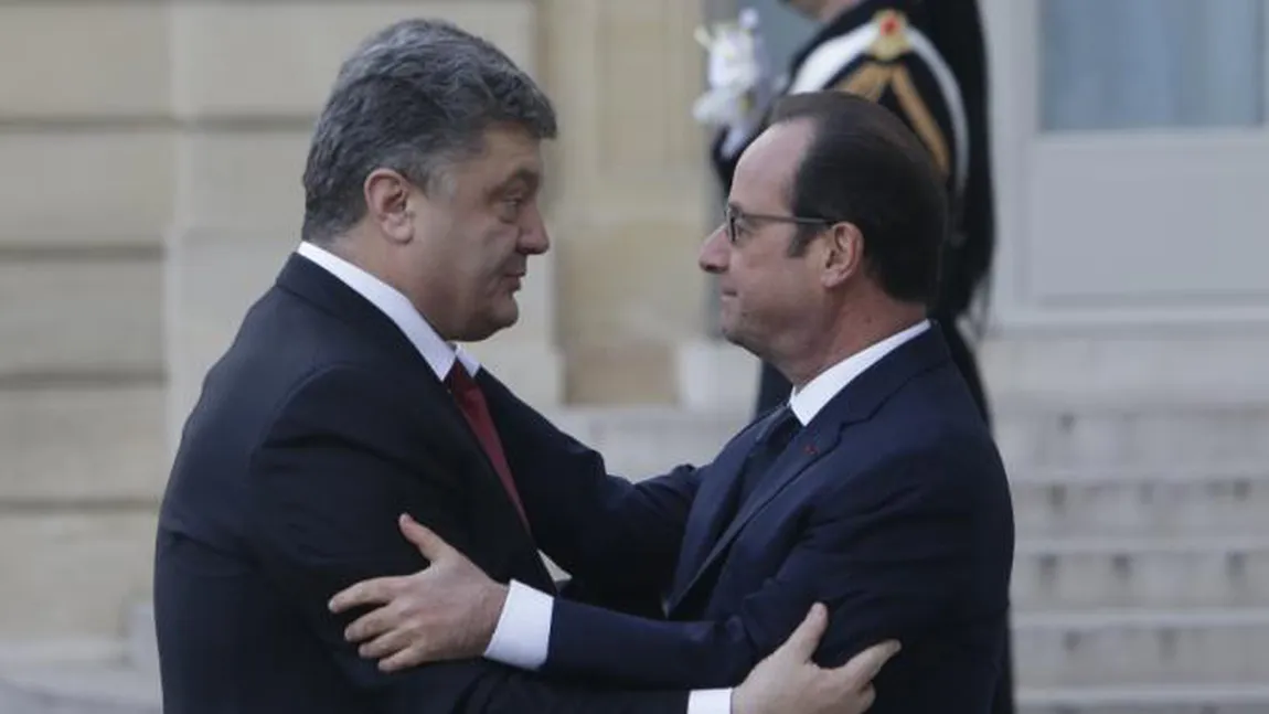 Confruntări în faţa Parlamentului de la Kiev. Hollande se solidarizează cu Poroşenko