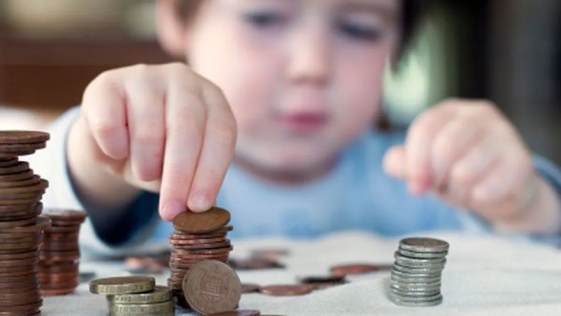 Copiii cu părinţi plecaţi in Germania s-ar putea să primească alocaţii mai mici
