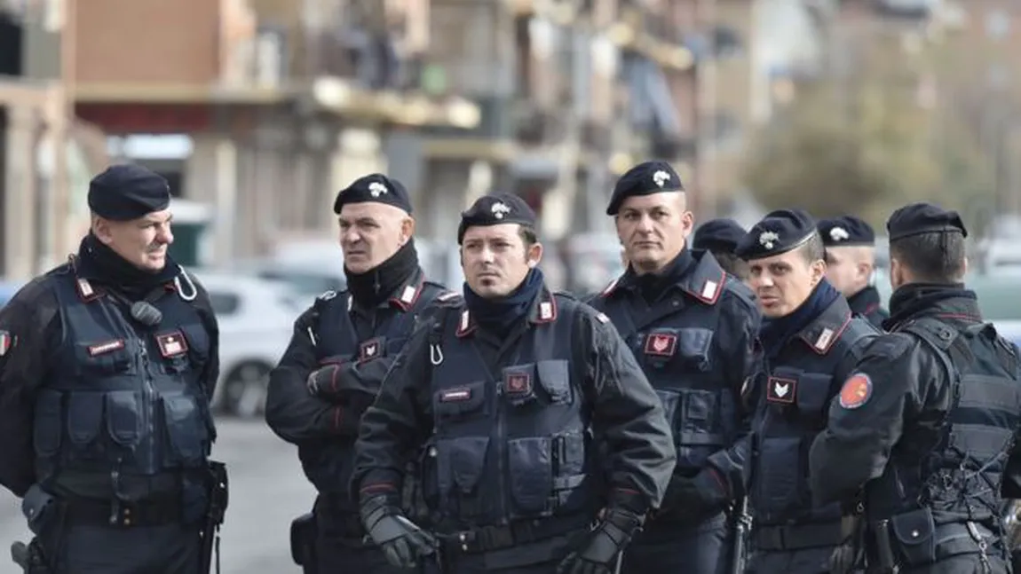 O gravidă româncă a spart mai multe locuinţele din Italia. Era înarmată cu arme de foc. Carabinierii au arestat-o