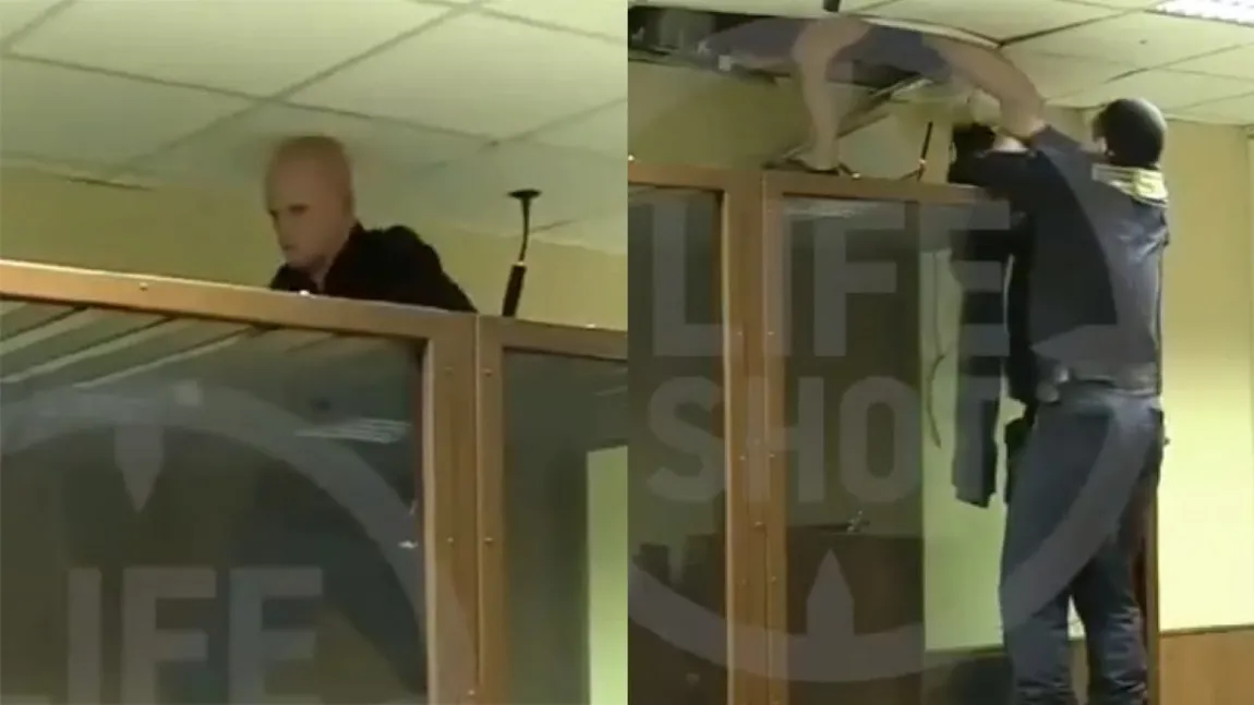 Acuzat că şi-a ucis sora, a încercat să evadeze prin tavanul boxei acuzaţilor. A rămas blocat şi cu pantalonii în vine VIDEO