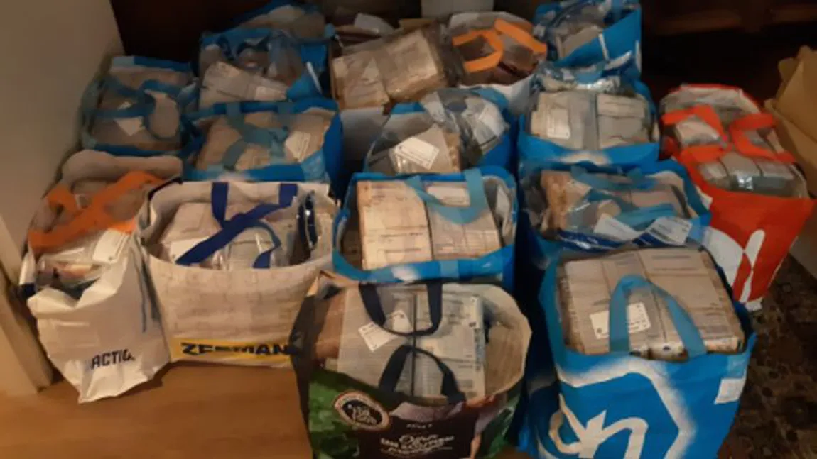 Un sfert de tonă de bani găsiţi într-un apartament. Suma uriaşă confiscată de poliţie de la infractori