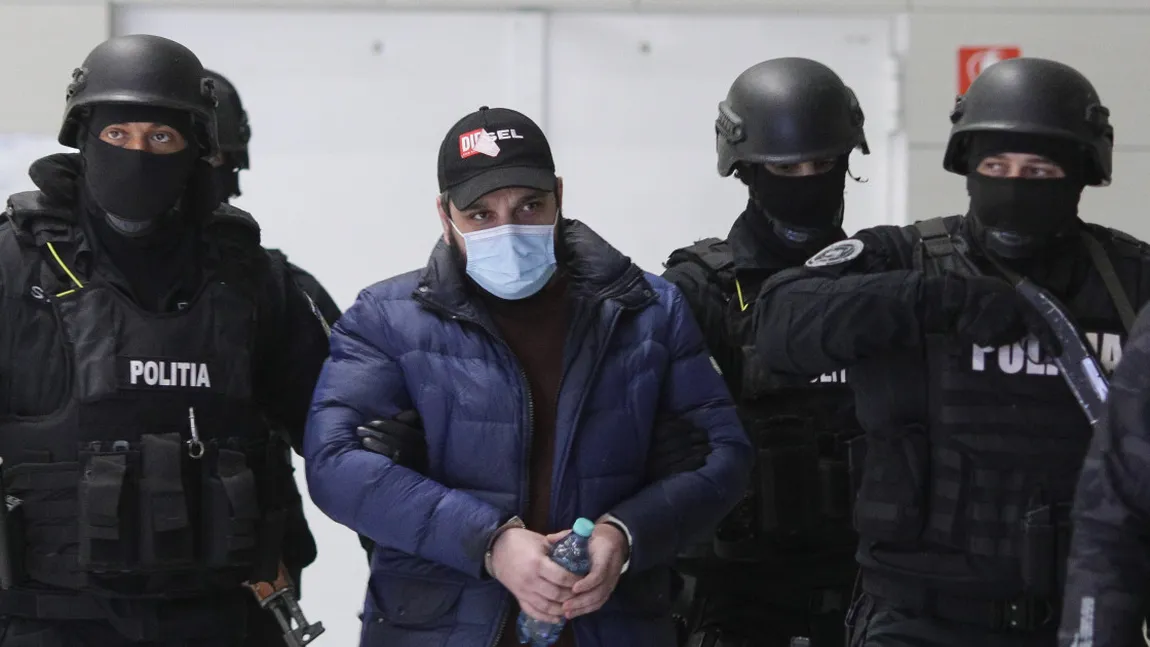 Fiul lui Sile Cămătaru, adus în cătușe în țară. Se afla pe lista Most Wanted a Poliției Române