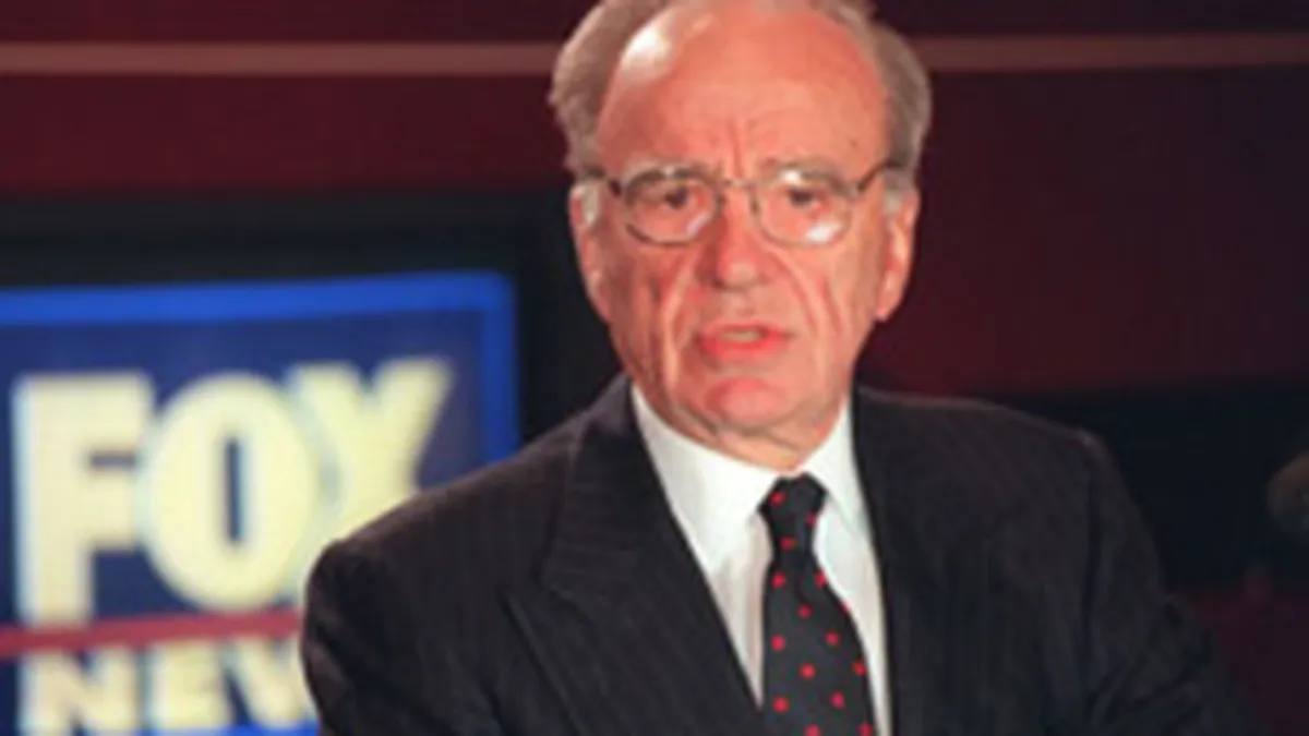 Patronul Murdoch se implica editorial la The Sun, dar nu si la The Times