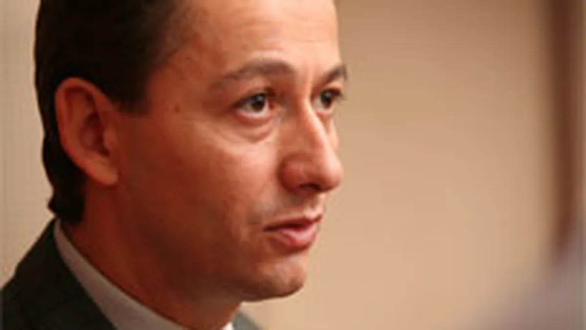 Seful roman al BenQ in regiune: Criza ne forteaza sa revizuim din nou in jos estimarile