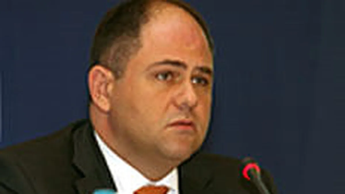 Oprescu, Alpha Bank: Revizuim planurile de extindere pentru 2009