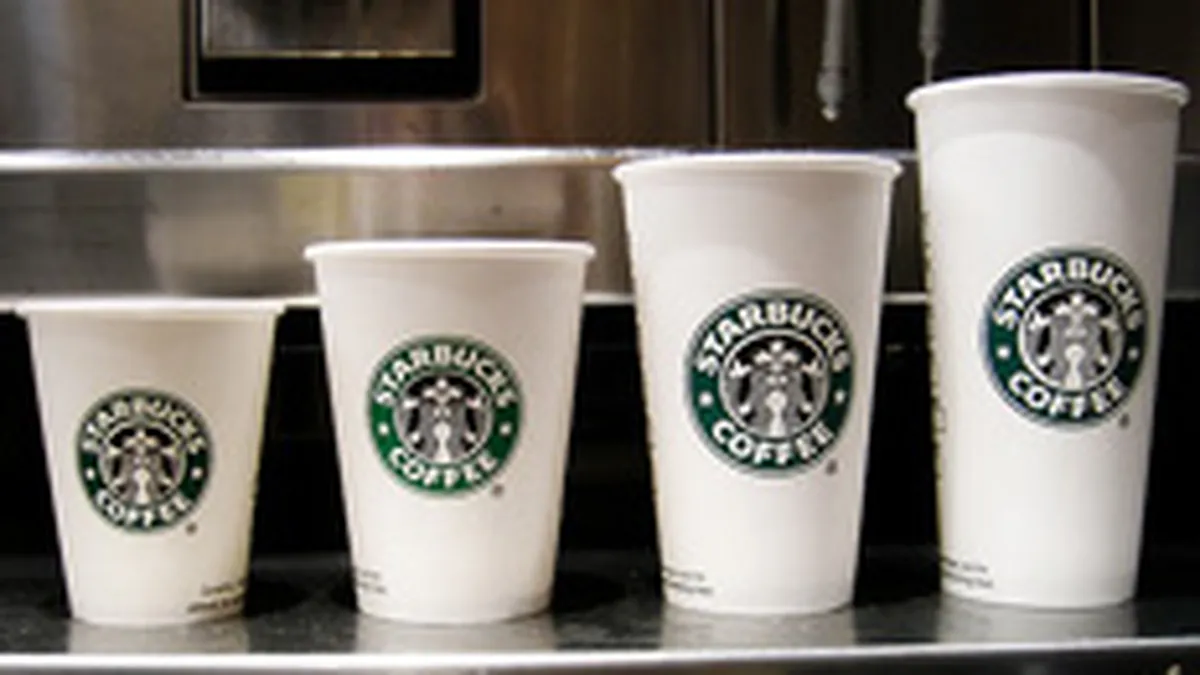 Starbucks reduce preturile unor produse pentru prima data de la infiintare