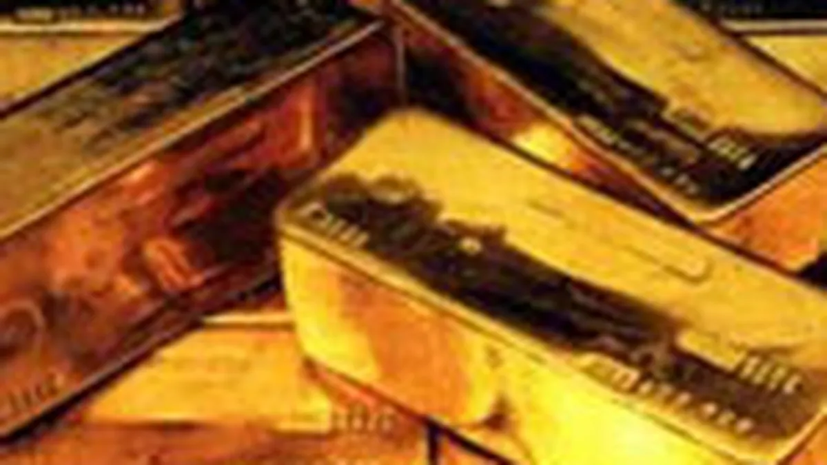 Aurul a atins un nou nivel record: 1.036,60 dolari/uncie