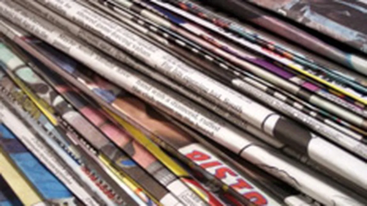 Criza \musca\ din ziare: Romanii nu mai dau bani nici pe tabloide