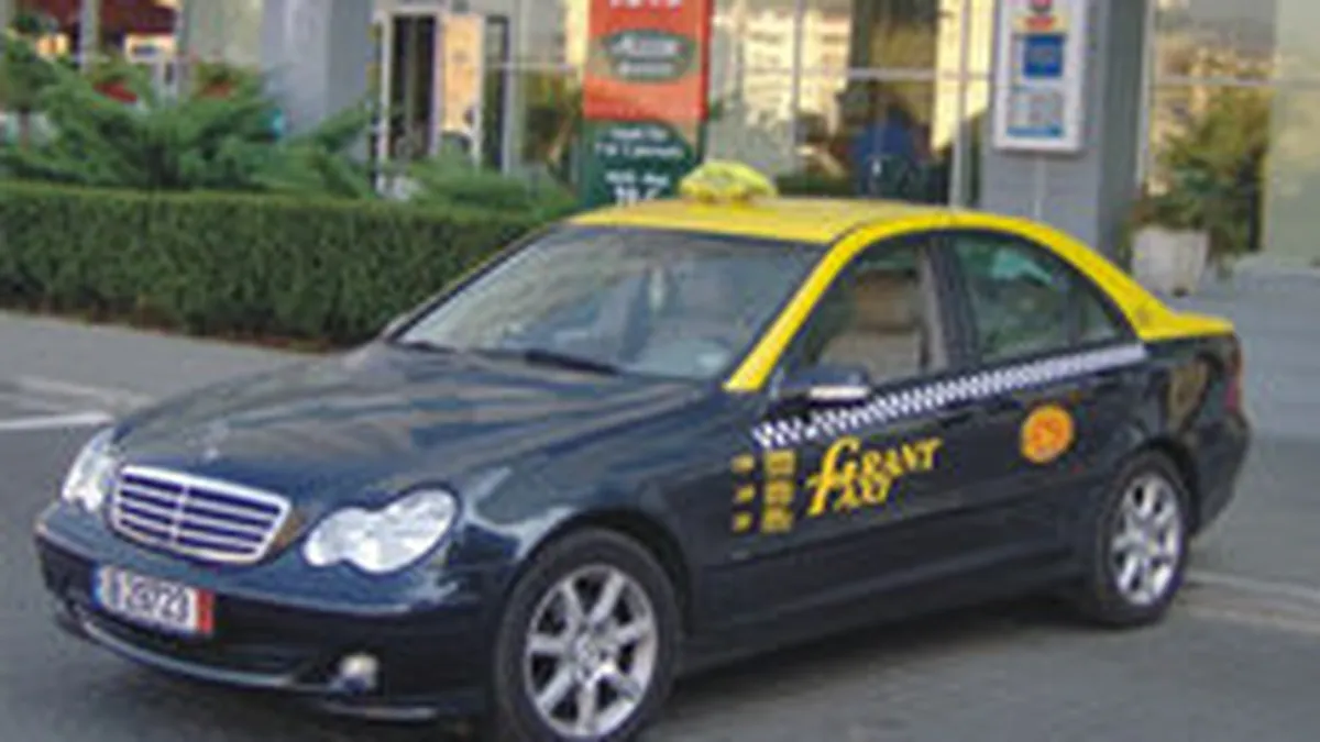 UniCredit Tiriac Bank a instalat aparate POS in masini Grant Taxi