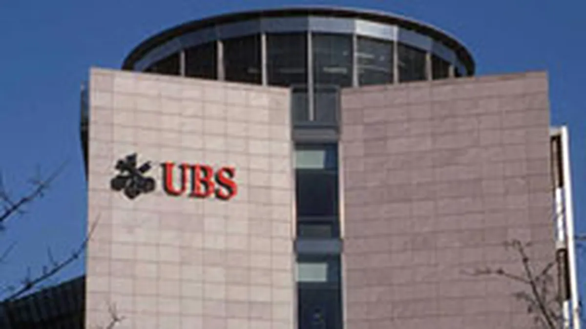 Scaderea castigurilor din investitii a injumatatit profitul UBS in T2