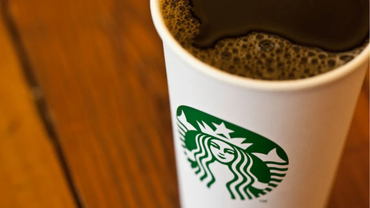 Starbucks, pusa la zid de clientii din Anglia