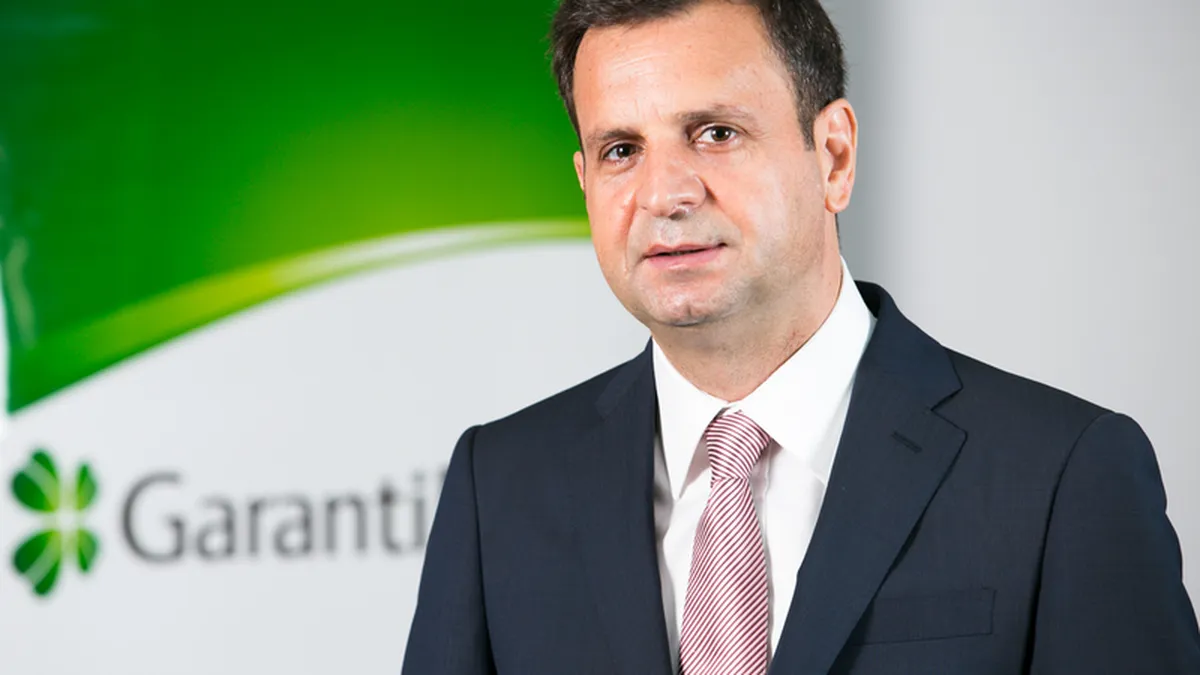 Garanti Bank: Stimulul fiscal dat de reducerea de taxe va fi vizibil mai ales anul viitor
