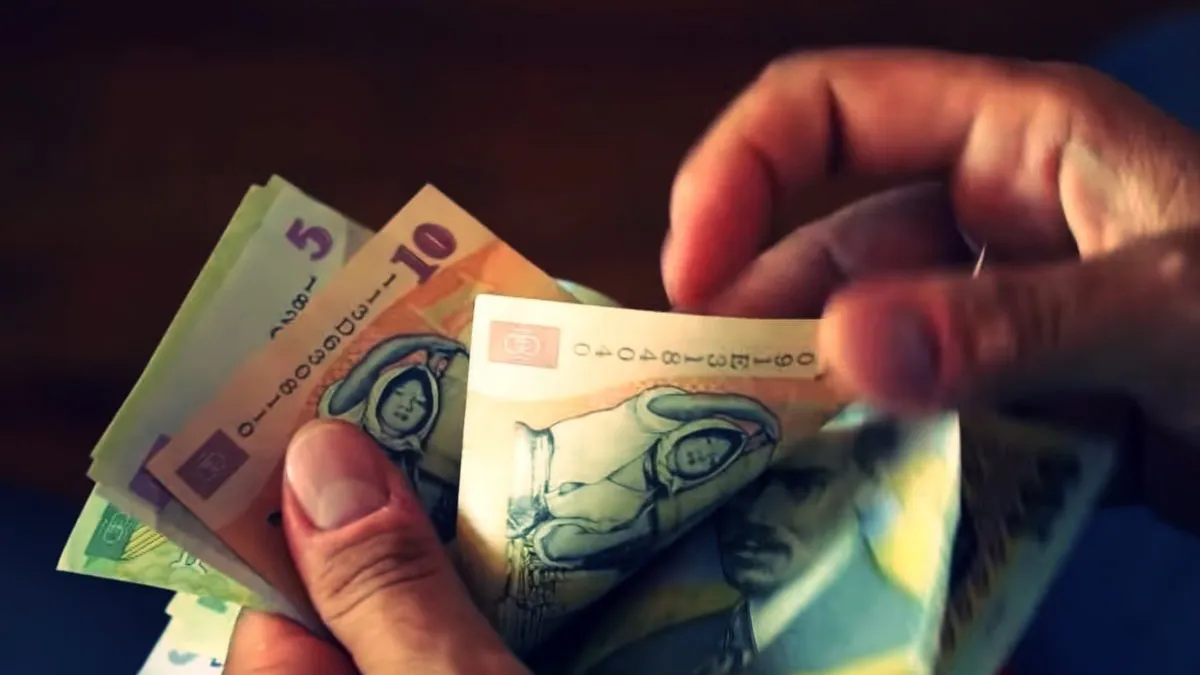 Ajutor de 180 de lei pentru familiile din România. Cine va beneficia de bani şi ce condiţii trebuie să îndeplinească