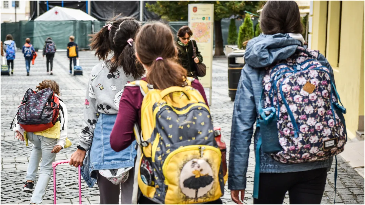 Alocația pentru copii, exclusă de la calculul venitului minim în cazul tichetelor educaționale